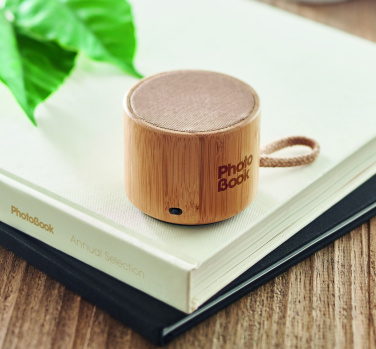 Logotrade promotional giveaway image of: Round bamboo wireless speaker